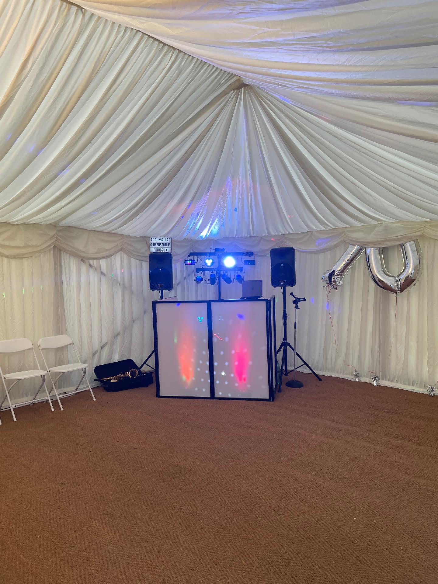 DJ booth setup at a marquee event