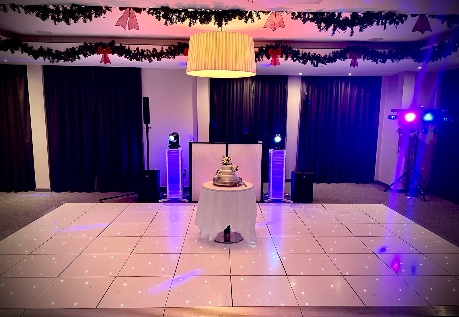 Wedding DJ setup with starlit dance floor