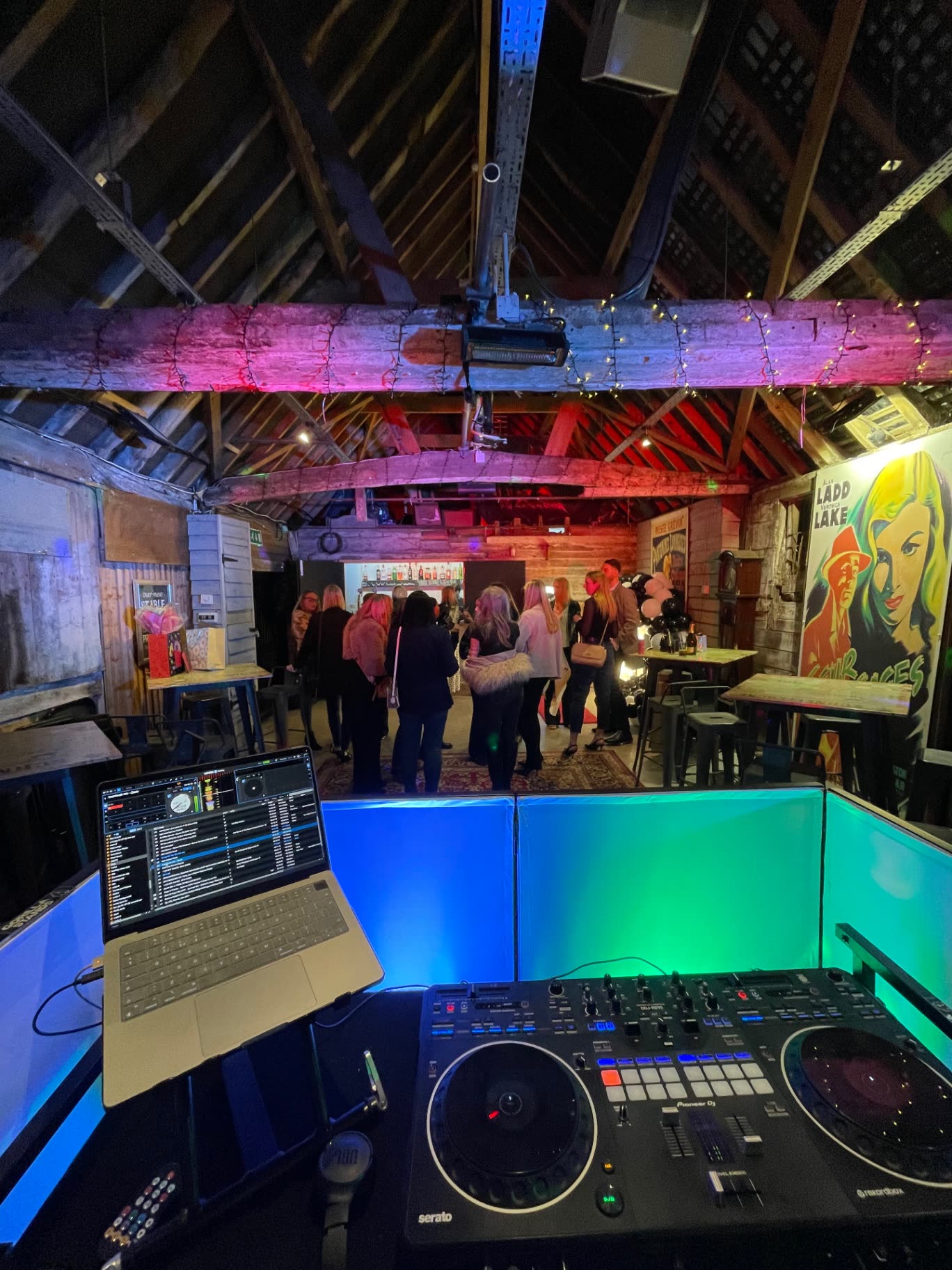Behind the decks at a barn party